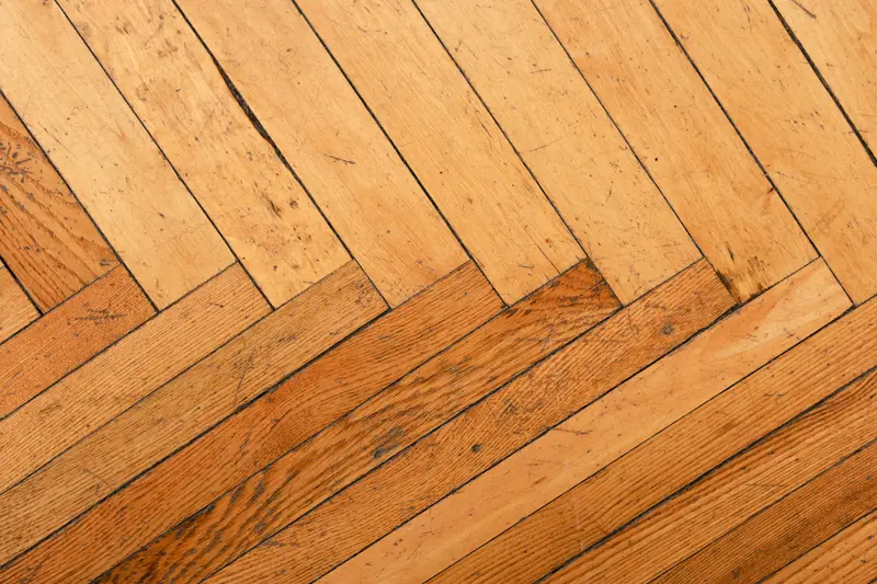 Warm oak herringbone floor in afternoon light