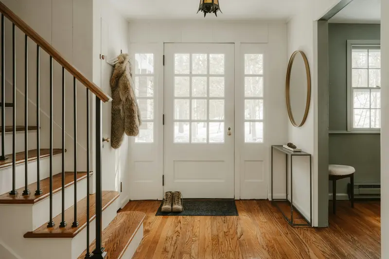 Front entry with refinished oak floor and matching staircase
